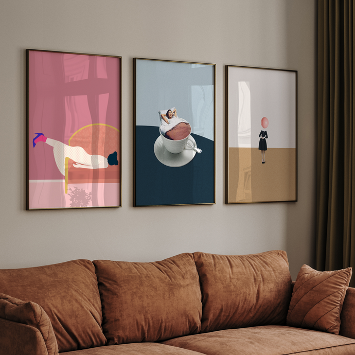 Brown sofa in a living room with abstract art on the wall