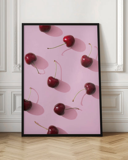 Cherries on pink background