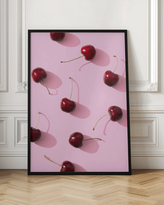 Cherries on pink background