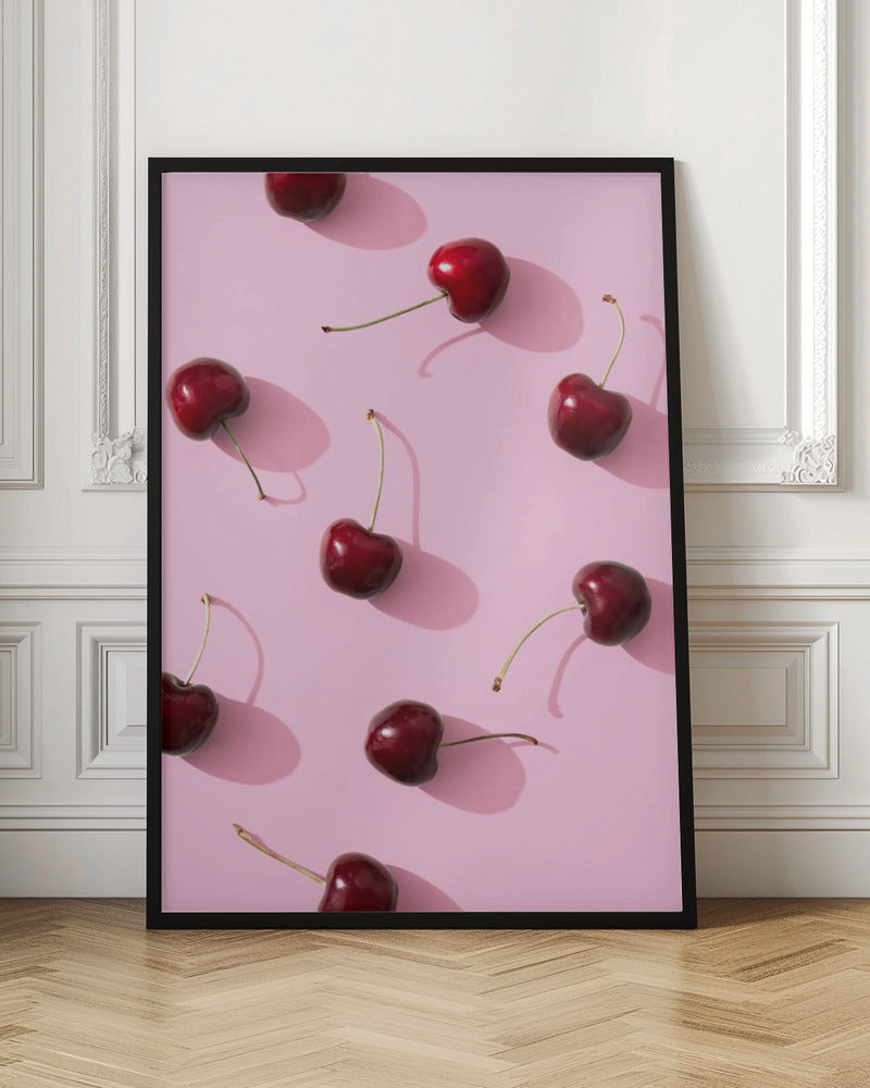 Cherries on pink background
