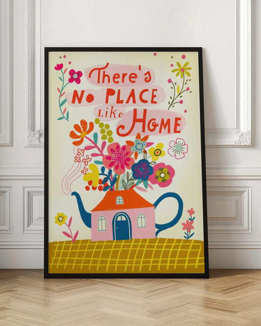 A framed poster with a colorful illustration of a house with flowers and the text 'There's No Place Like Home' displayed on a wall.