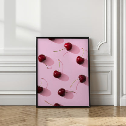 Cherries on pink background